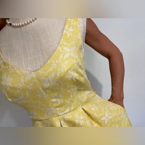Anthropologie feminine dress. Happy yellow with a vintage look.